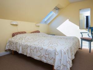 Ένα ή περισσότερα κρεβάτια σε δωμάτιο στο 4 person holiday home in Ringkøbing