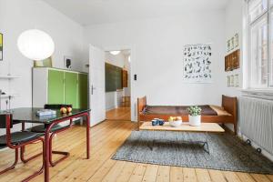 a living room with a table and a couch at 20129-samso-Landevejen-32 in Nordby