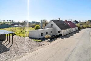 an aerial view of a white house and a street at 20203-Samso-Vrangstrup-5 in Tanderup