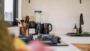 a kitchen counter with a blender on a counter top at Lucky Villa 1 in Uluwatu