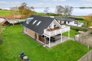 an aerial view of a house with a deck at AE285-Aeroskobing-Hanses-Ager-4 in Ærøskøbing