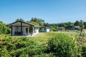 a small white house with a gazebo at SB50361-Nordborg-Krabbestien-11 in Nordborg
