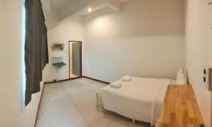 Ένα ή περισσότερα κρεβάτια σε δωμάτιο στο GO INN Asiatique Bangkok โก อินน์ เอเชียทีค เจริญกรุง +15 φωτογραφίες