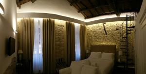 A bed or beds in a room at Arcipelago 41