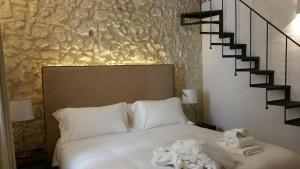 A bed or beds in a room at Arcipelago 41