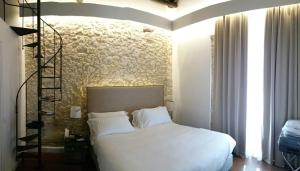 A bed or beds in a room at Arcipelago 41