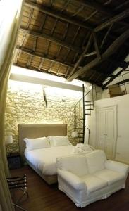 A bed or beds in a room at Arcipelago 41