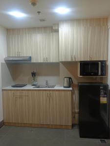 Kuchyň nebo kuchyňský kout v ubytování Greenbelt Excelsior