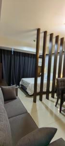 Postel nebo postele na pokoji v ubytování Greenbelt Excelsior