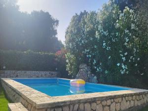 Bazén v ubytování Villa in Corfu near Porto Timoni Beach nebo v jeho okolí