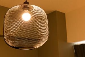 a glass light fixture hanging from a ceiling at SN4B ノワールネスト 都会のシックな隠れ家 Noir Nest urban chic retreat in Nagoya