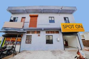 a building with a sign in front of it at Hotel O Rudraksh Residency in Bhilai