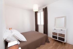 Postel nebo postele na pokoji v ubytování Appartement plage du Trottel