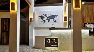 圣胡安Kawayan Holiday Resort的墙上有一张世界地图的标志 更多82张照片