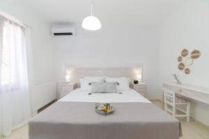 Postel nebo postele na pokoji v ubytování Villa Elia + 55 fotografií