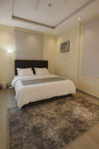 Ένα ή περισσότερα κρεβάτια σε δωμάτιο στο Apartment in Madinah