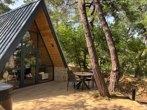 Zahrada ubytování Chalet CanopéA 28 m2 au Domaine CollinéA + 11 fotografií