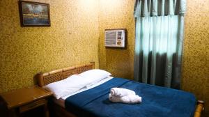 Postel nebo postele na pokoji v ubytování Dawal Beach Resort