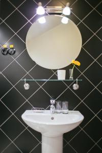 Ванная комната в Kuldigas Metropole