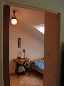 Łóżko lub łóżka w pokoju w obiekcie Apartament Paula