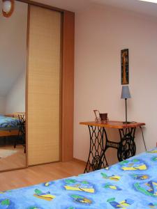 Łóżko lub łóżka w pokoju w obiekcie Apartament Paula
