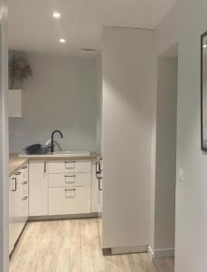 Kuchyň nebo kuchyňský kout v ubytování M75 Marquer Jolie chambre en colocation