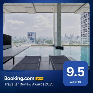 a room with a view of a city at Siamese Residence Landmark MRTA Station Bangkok in Bangkok