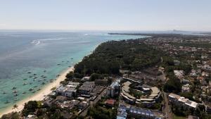 an aerial view of a beach with boats in the water at Cozy Studio 2 in Trou aux Biches