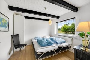 Cama ou camas em um quarto em Ferienhaus Tuen