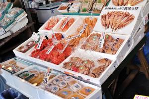 a display of different types of food in boxes at Holiday Inn & Suites Sapporo Odori Park by IHG in Sapporo