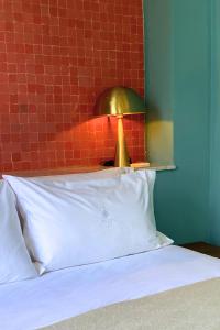 Ένα ή περισσότερα κρεβάτια σε δωμάτιο στο Amanar Marrakech +23 φωτογραφίες