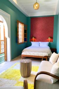 Ένα ή περισσότερα κρεβάτια σε δωμάτιο στο Amanar Marrakech