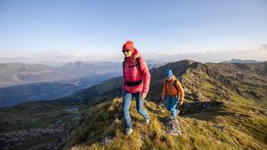 two people standing on top of a mountain at Apart Garber in Zellbergeben