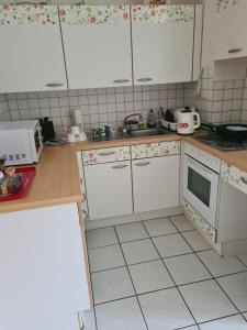 Η κουζίνα ή μικρή κουζίνα στο Kleine Wohnung
