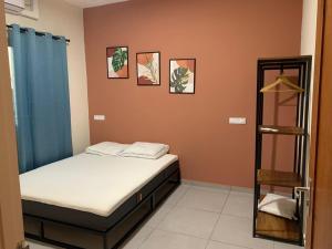 Ένα ή περισσότερα κρεβάτια σε δωμάτιο στο Green Village Resort +30 φωτογραφίες