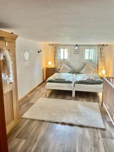 Ένα ή περισσότερα κρεβάτια σε δωμάτιο στο Ferienhaus Erbse