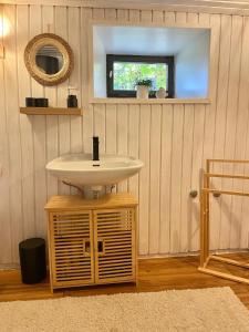 Μια τηλεόραση ή/και κέντρο ψυχαγωγίας στο Ferienhaus Erbse
