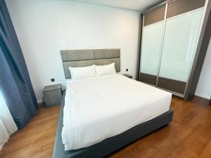 Ліжко або ліжка в номері vortex suits klcc by Bond +10 фото