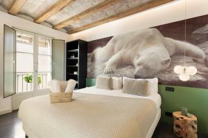 Ένα ή περισσότερα κρεβάτια σε δωμάτιο στο Ola Living Portaferrissa