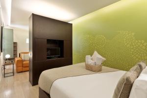 Ένα ή περισσότερα κρεβάτια σε δωμάτιο στο Ola Living Portaferrissa