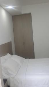 Hotel Boutique Santorini Class客房内的一张或多张床位