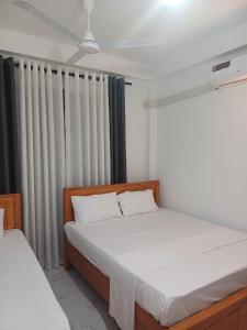 Katil atau katil-katil dalam bilik di Summer Dream +6 gambar