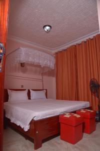 Ένα ή περισσότερα κρεβάτια σε δωμάτιο στο Kanamba invent hotel