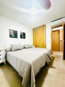 Ένα ή περισσότερα κρεβάτια σε δωμάτιο στο VUT La Ermita