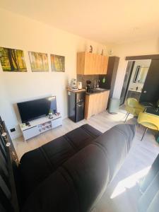 Kuchyň nebo kuchyňský kout v ubytování Cottage La Forêt
