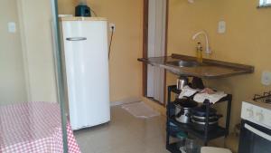 Köök või kööginurk majutusasutuses Hospedagem Tia Dete