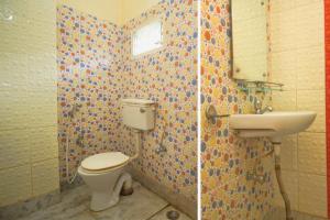 two pictures of a bathroom with a toilet and a sink at Hotel O Siljong in Gangtok +22 photos