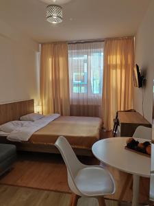 Ένα ή περισσότερα κρεβάτια σε δωμάτιο στο Tribu