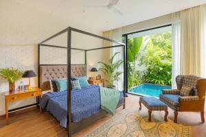 Ruang duduk di ELIVAAS Puro Sol 3-BHK Villa In a Gated Complex With Private Pool & Bathtub Near Popular Beaches +29 gambar