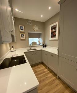 Kuchyň nebo kuchyňský kout v ubytování Garden Flat